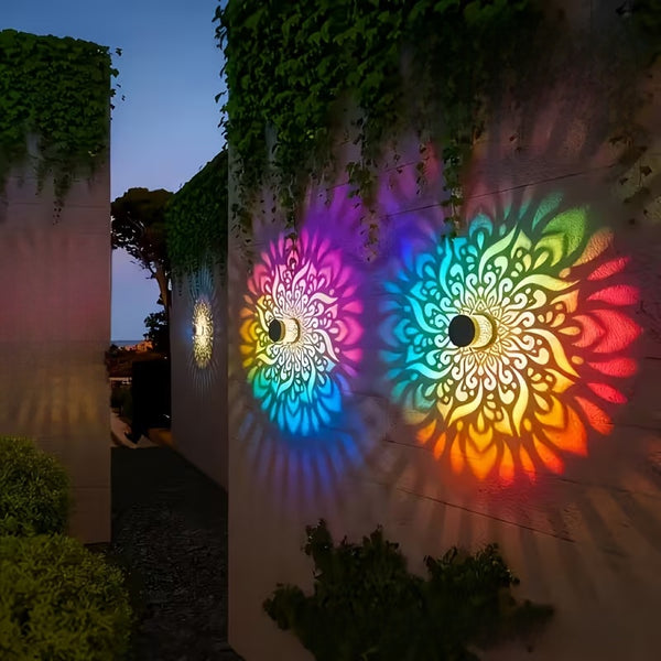 Mandala light projecting patterns at night